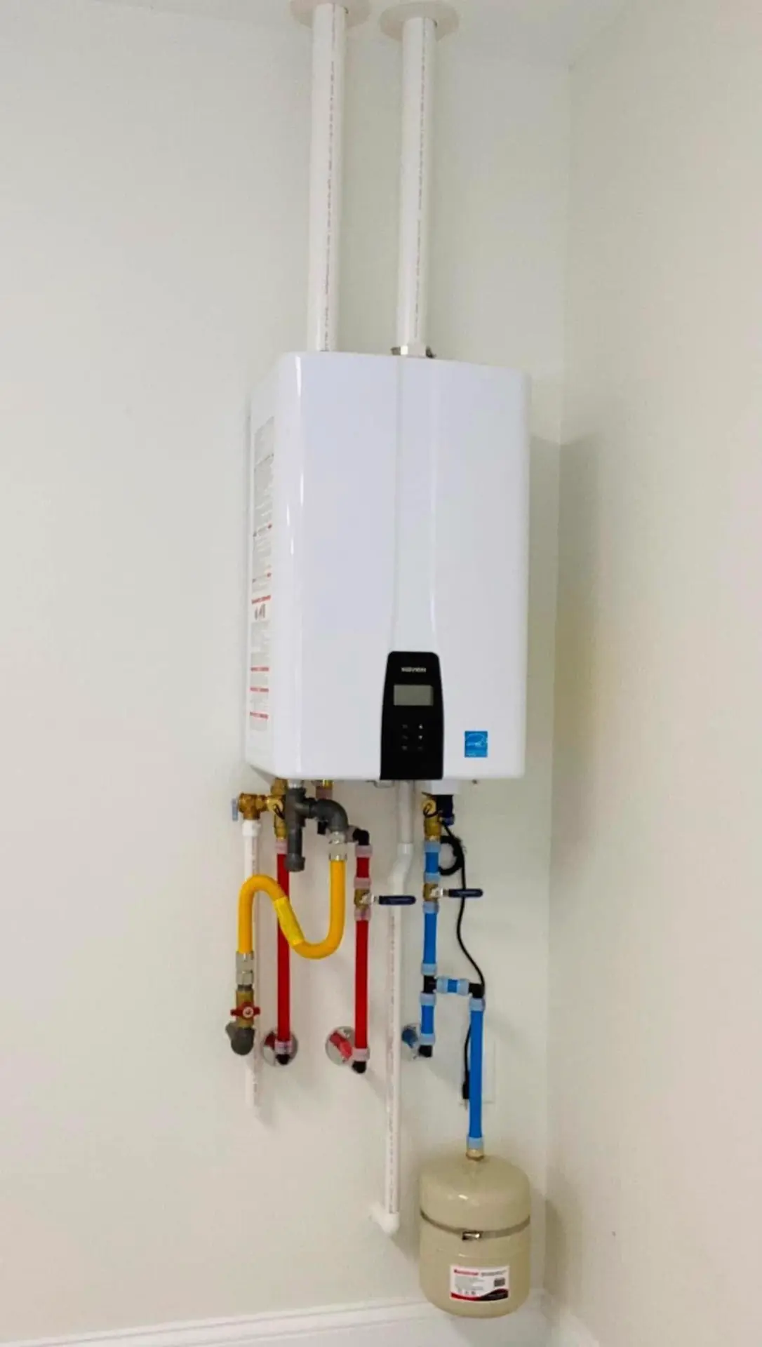 Clean tankless water heater installation by Crest Plumbing