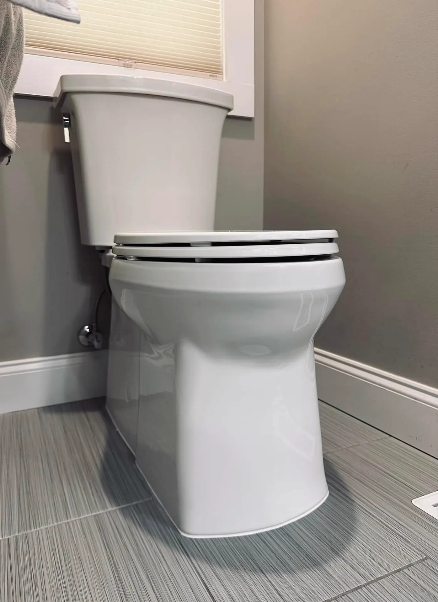 Finished toilet installation by Crest Plumbing